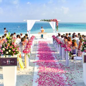 Professional AV equipment setup with lighting consoles, rigging hardware, and sound systems for event production