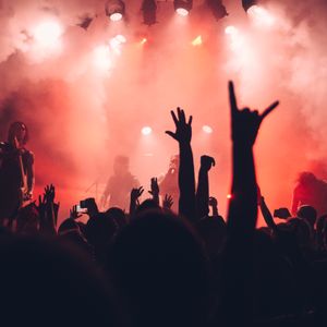 Event setup with staging, lighting, and AV equipment for a corporate function or social event